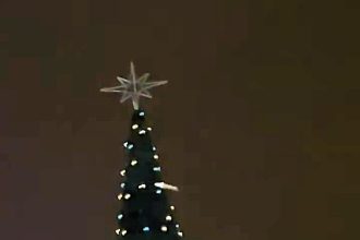 A man was rescued after getting stuck atop a giant Christmas tree in Katowice, Poland, triggering a major emergency response with police, fire trucks, and an ambulance.