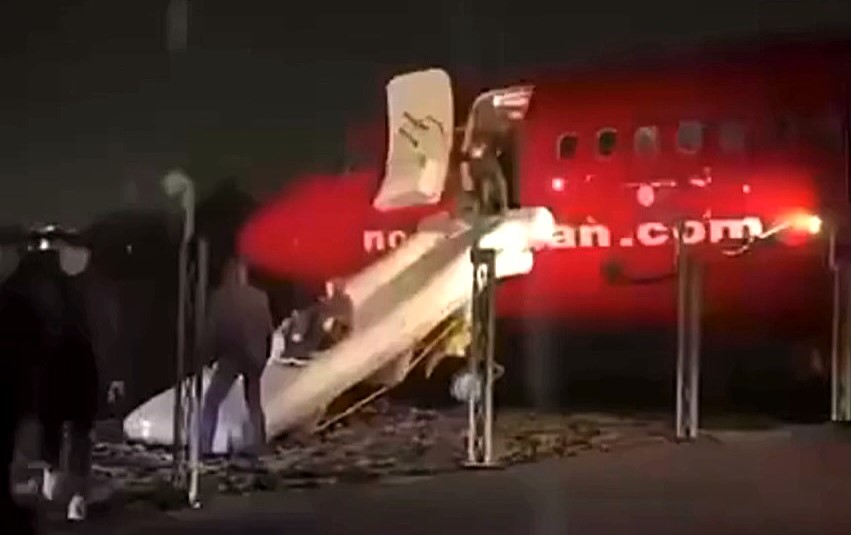 Norwegian Boeing 737 overshoots icy runway in Molde, halting 50 feet from the sea. Passengers evacuated safely via slides; weather and runway conditions under investigation.