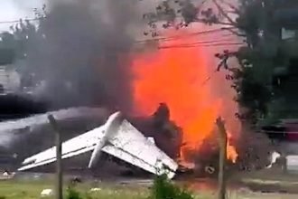 Tragedy in Buenos Aires as private jet crashes off runway, killing two pilots. Investigators look into possible braking system failure. Homes evacuated near crash site.