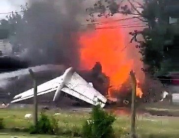 Tragedy in Buenos Aires as private jet crashes off runway, killing two pilots. Investigators look into possible braking system failure. Homes evacuated near crash site.
