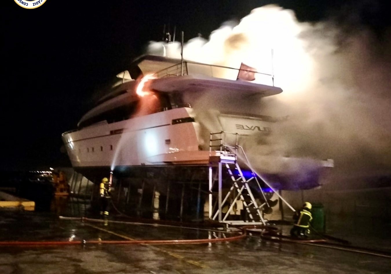 Luxury £11.52M Superyacht Elysium Engulfed in Flames at Spanish Port, Taking 12 Firefighters Hours to Extinguish. Electrical Work Suspected as Cause, No Foul Play.