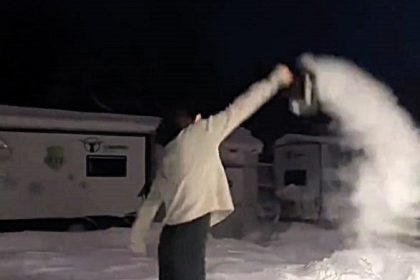 A woman suffered second-degree burns attempting a viral boiling water ice trick in -20°C weather. Despite the mishap, she tried again with precautions.