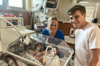 A couple's twins beat the odds after a life-threatening diagnosis in the womb. Born healthy despite complications, their inspiring story offers hope to parents facing challenges.