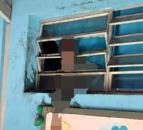 Decomposed burglar found stuck in a nursery school window in Venezuela after failed break-in. Authorities believe he bled to death during his escape attempt.