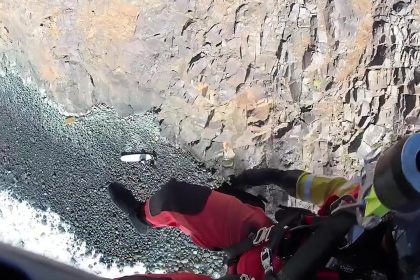 A dad and son were rescued by helicopter after getting stranded on a rock while boogie boarding at Indian Beach, Oregon, prompting warnings about the dangers of sneaker waves.