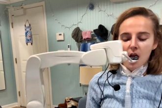 Paralyzed after a skiing accident, Rebecca Koltun regains independence with a robotic feeding device. The 25-year-old inspires millions by sharing her adaptive journey.