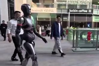 A humanoid robot, SE01, wowed crowds in Shenzhen, China, as it strolled through the streets, mimicking human movements. Built by Engine AI, it marks a leap in robotics innovation.