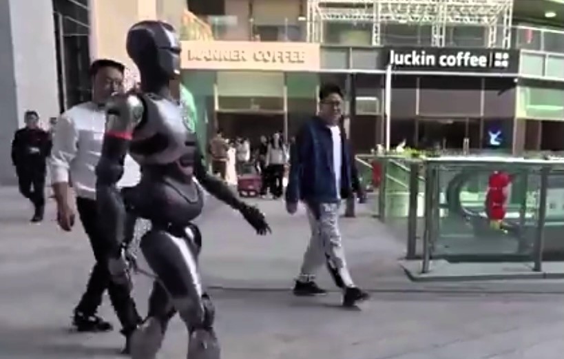 A humanoid robot, SE01, wowed crowds in Shenzhen, China, as it strolled through the streets, mimicking human movements. Built by Engine AI, it marks a leap in robotics innovation.