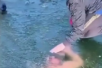 Winter swimming enthusiast Lu Man dies after getting trapped under ice during a challenge in Hunan, China. Experts warn of the dangers of ice swimming.