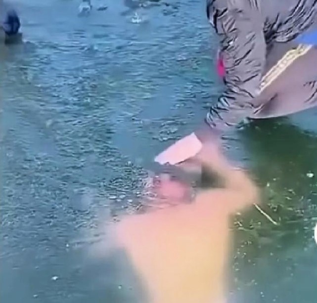 Winter swimming enthusiast Lu Man dies after getting trapped under ice during a challenge in Hunan, China. Experts warn of the dangers of ice swimming.