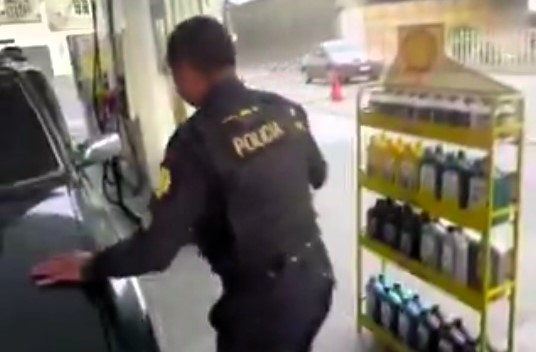 Two Guatemalan police officers arrested after being caught drunk in uniform at a petrol station, facing dismissal and fines for damaging a private vehicle while on duty.