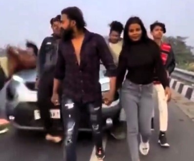 Wannabe influencers struck by a speeding car while filming on a road for a social media video. Viral footage sparks safety warnings and condemnation of the driver’s actions.