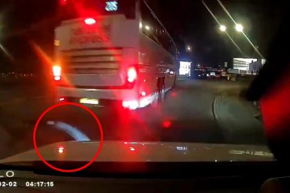 A driver and a National Express coach collide near Heathrow, sparking debate over who was at fault as fellow motorists weigh in on the incident.