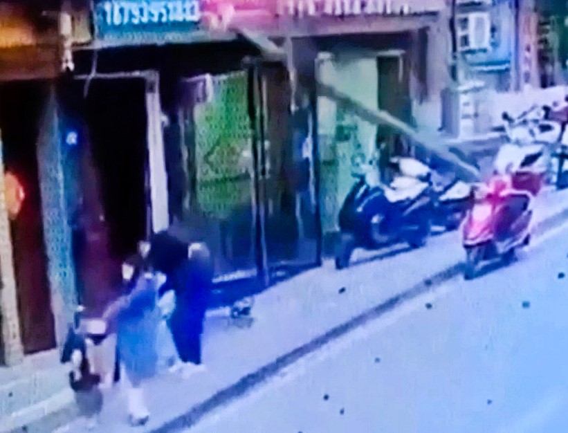 A man in China was critically injured after a falling utility pole struck him in front of his family. He remains in a coma as authorities investigate the incident.