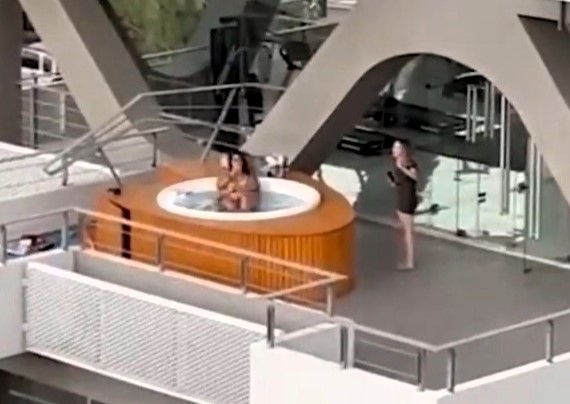 A couple was caught on camera "romping" in a hot tub on a luxury apartment balcony in San Juan, Mexico. The viral footage sparked outrage and calls for action.