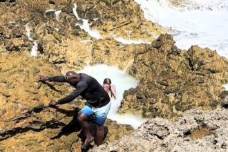 Influencer Avalon Mira narrowly escapes being swept out to sea by powerful waves in Curacao, gripping rocks to survive as her terrified family watches from shore.