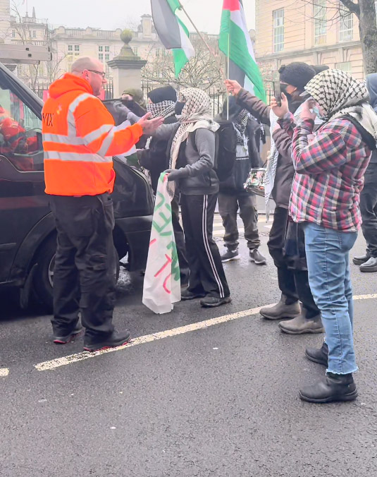 A van drove into a crowd of pro-Palestine protesters blocking a road outside Cardiff University, knocking one person over. Police are investigating the incident.