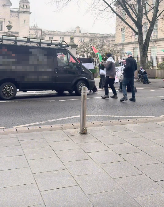 A van drove into a crowd of pro-Palestine protesters blocking a road outside Cardiff University, knocking one person over. Police are investigating the incident.