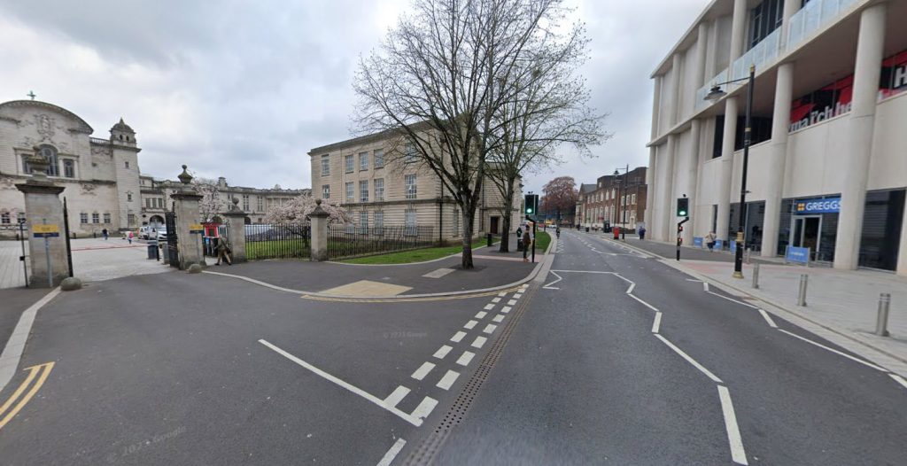 A van drove into a crowd of pro-Palestine protesters blocking a road outside Cardiff University, knocking one person over. Police are investigating the incident.