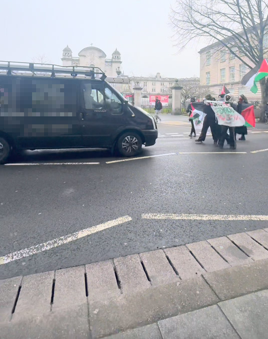A van drove into a crowd of pro-Palestine protesters blocking a road outside Cardiff University, knocking one person over. Police are investigating the incident.