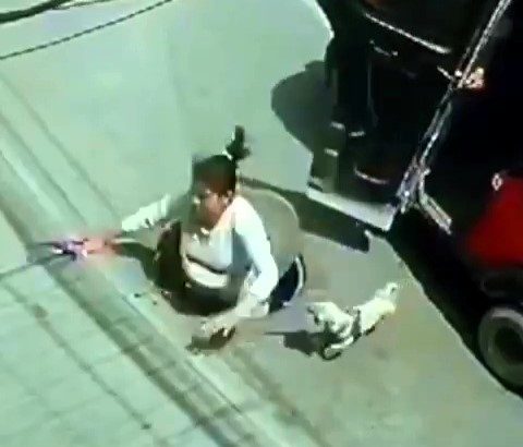 A woman fell into a manhole after stepping out of a tuk-tuk in Lima, Peru. CCTV captured the dramatic moment as bystanders rushed to help her climb out safely.