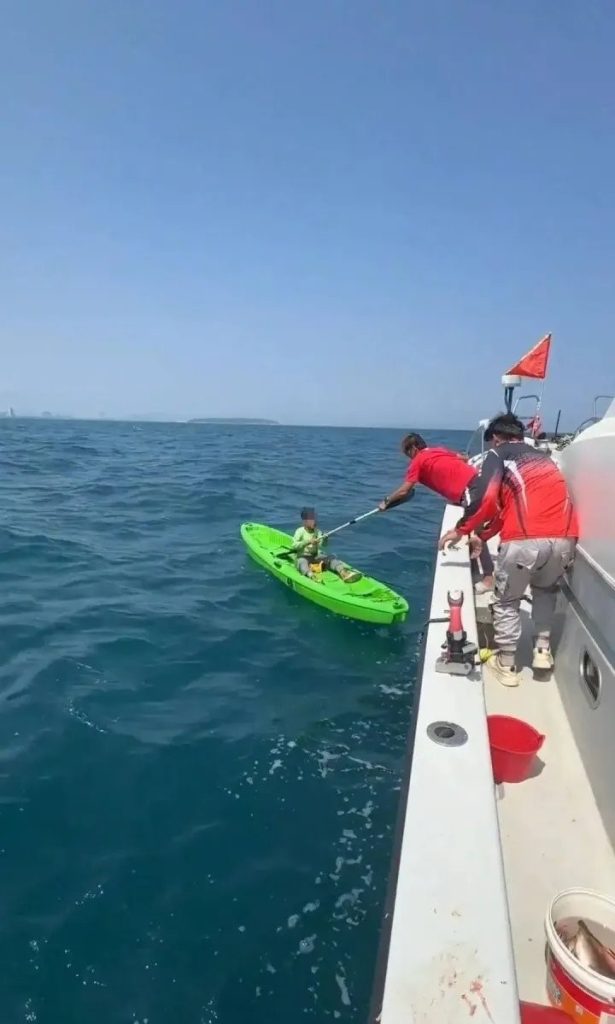 A 10-year-old boy drifted out to sea on a solo squid fishing trip and spent the night alone before being rescued by a passing boat off the coast of southern China.