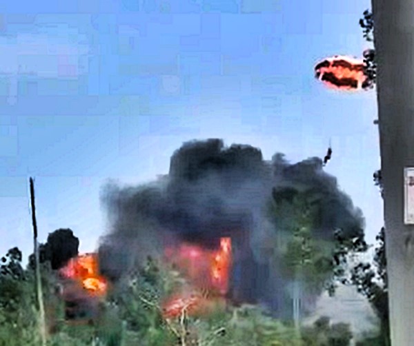 A Chinese J-15 fighter jet crashed in Hainan during a training exercise, erupting into a fireball. The pilot ejected safely, and an investigation is underway.