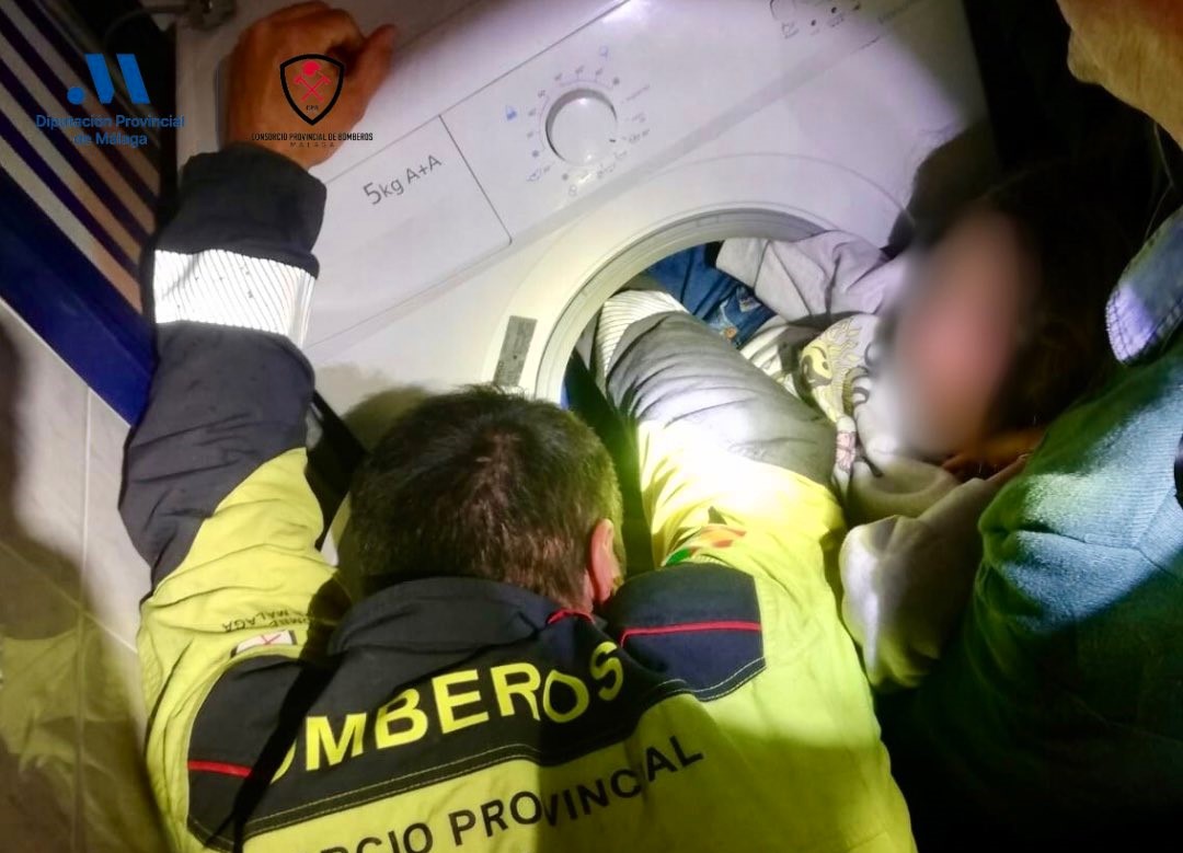 An eight-year-old girl in Spain had to be rescued by firefighters after getting stuck in a washing machine while playing - freed after 50 minutes with only minor bruises.