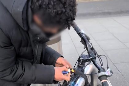 A man trying to steal a bike in Stratford burned his fingers with a lighter while attempting to melt the lock, sparking outrage and disbelief from onlookers.