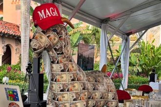 A bizarre gold statue of Donald Trump, featuring horns, hooves, and a MAGA cap, sold for $300,000 at a Mar-a-Lago auction benefiting a controversial dog charity.