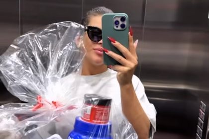Influencer slammed for gifting pal a fitness basket and scales, sparking backlash. She says it was thoughtful, but critics call it tone-deaf.
