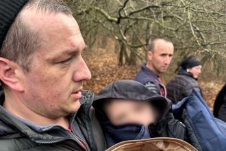 Three-year-old Ostap Maidanyuk survived a freezing night in Ukraine by cuddling his loyal dog, Barbos, before being found safe in a ravine after an extensive search.