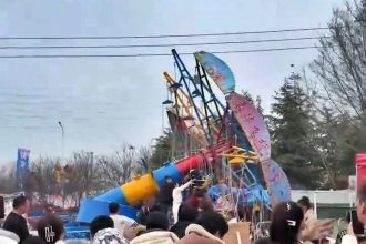 A swing carousel collapsed at a fairground in China, killing one person and injuring two others as terrified revellers fled – police are now investigating the cause.