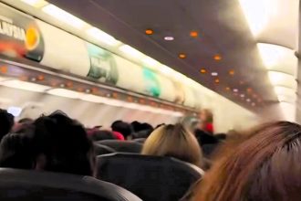 An AirAsia flight carrying 171 people made an emergency landing in Malaysia after an engine fire broke out. The plane circled for two hours before landing safely.