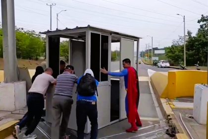 A ‘rogue Superman’ led vigilantes in Colombia to destroy a toll booth, claiming it was “theft,” as locals protested against the fee that hasn't improved infrastructure.