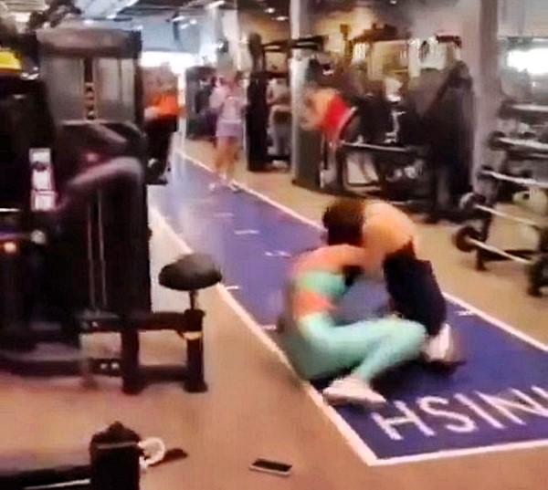 Gym brawl erupts between two couples in Brazil - punches, kicks, and chaos caught on camera. See what led to the shocking fight and how it all ended.