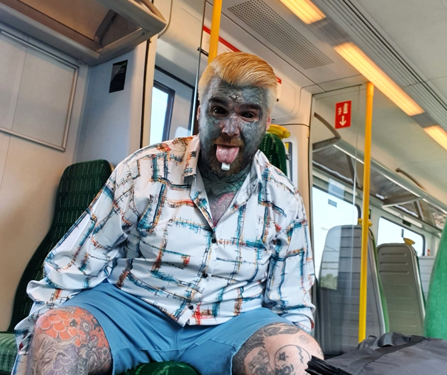 Britain’s most tattooed man faces daily judgment as people refuse to sit next to him on transport and secretly snap photos, but he refuses to let it hold him back.