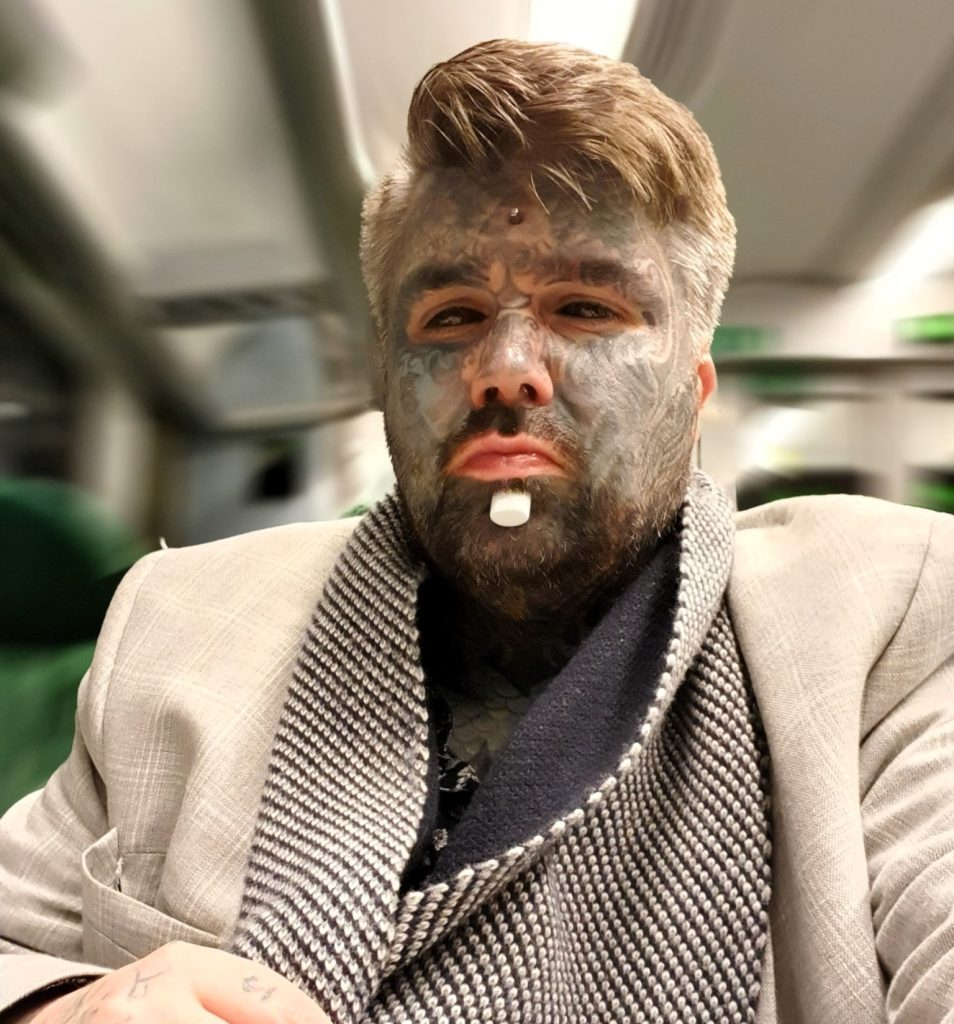 Britain’s most tattooed man faces daily judgment as people refuse to sit next to him on transport and secretly snap photos, but he refuses to let it hold him back.
