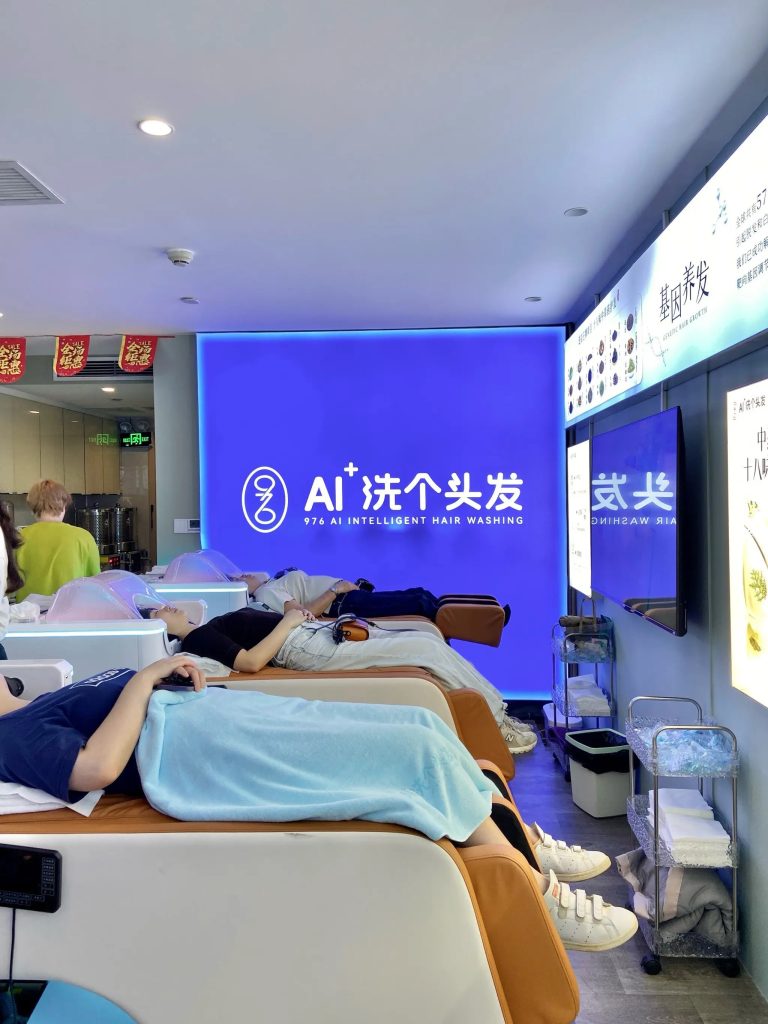 AI hair washing machines are revolutionizing salons with 13-minute scalp-analyzing washes, but mixed reviews highlight concerns over comfort and wash quality.