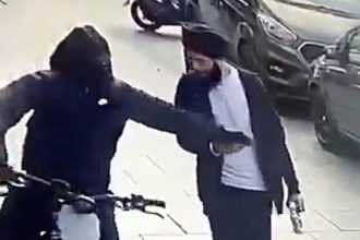 Shocking moment man’s phone is snatched by e-bike thief in London - victim left stunned mid-walk as brazen crook rides off in latest capital crime spree.