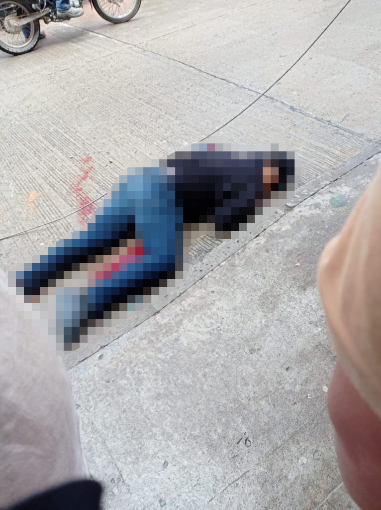 Two brave off duty cops in pyjamas and flip flops helped battle cartel gunmen after a grenade attack in Colombia leaving two suspects dead and three officers injured.