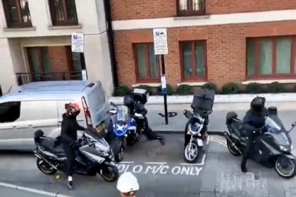A masked gang stole a motorbike in broad daylight in Knightsbridge as a brave builder gave chase with a broom, shocking witnesses and highlighting rising theft concerns.
