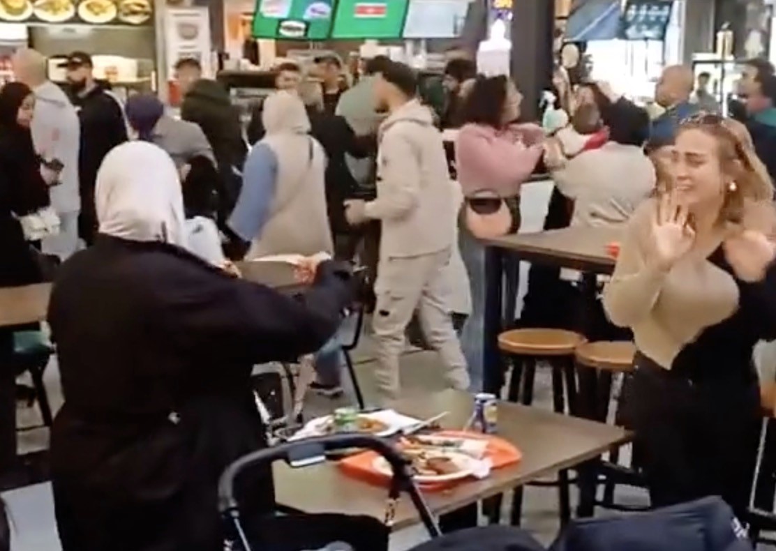 Mass brawl erupts in Dutch kebab shop as families watch in shock - chaos breaks out at De Bazaar Market with shouting, crying children and a woman swinging a chair.