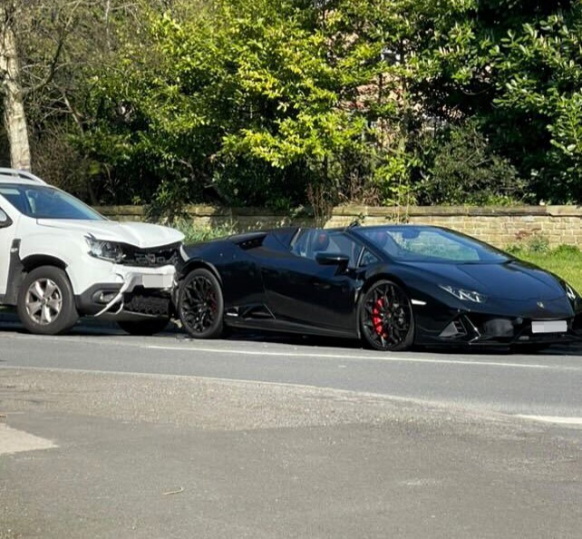 Lamborghini Huracan worth £200K crashes in Alderley Edge near Wilmslow Road, damaging four cars. No injuries reported in the luxury car pile-up near celeb homes.