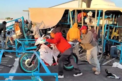 Locals loot new motorbikes from overturned lorry after crash near Mexico City - police investigate as footage shows residents wheeling stolen bikes through field.