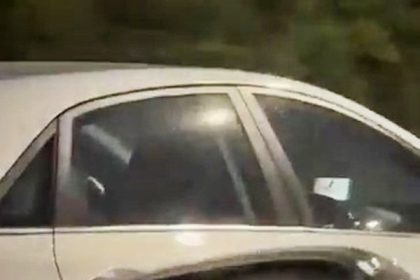 A driver was caught watching TV on her phone while behind the wheel on the A40 near Greenford - sparking outrage and calls for action over the dangerous behavior.