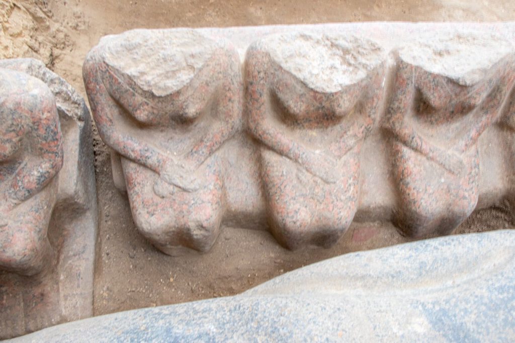 A 4,400-year-old tomb in Egypt's Saqqara Necropolis revealed a rare 15ft pink granite false door tied to Prince Userefre, offering insights into royal lineage and rituals.