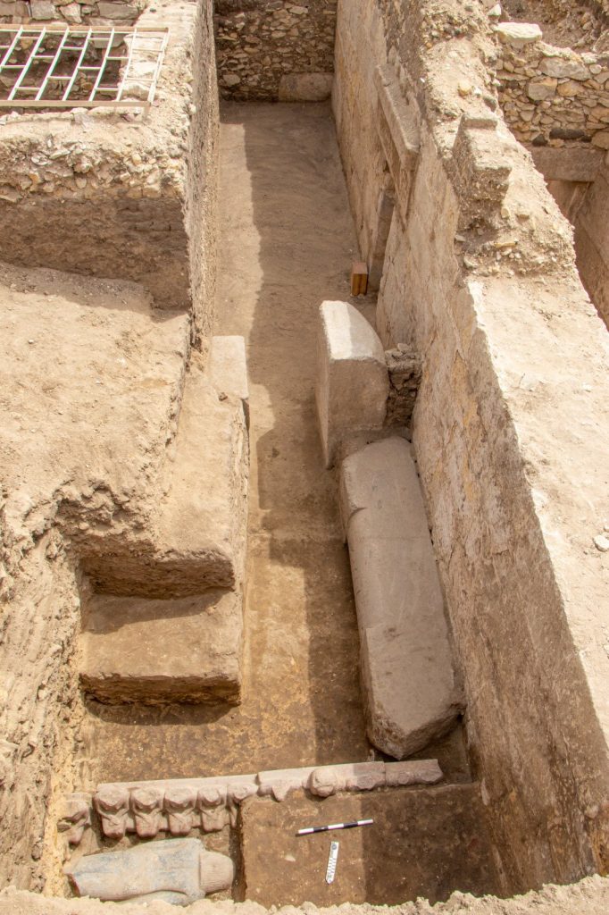 A 4,400-year-old tomb in Egypt's Saqqara Necropolis revealed a rare 15ft pink granite false door tied to Prince Userefre, offering insights into royal lineage and rituals.