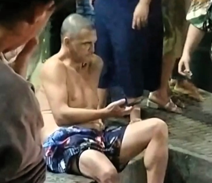 Off-duty cop left with foot hanging after car hits him and crashes into pizzeria in Brazil - woman lost control after motorbike collision, investigation underway.