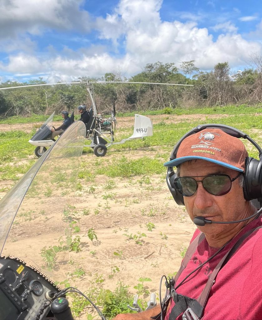 Pilot and tourist die in gyrocopter crash during livestream in Brazil - tragic accident on Areias Alvas Beach sparks investigation into cause and safety standards.